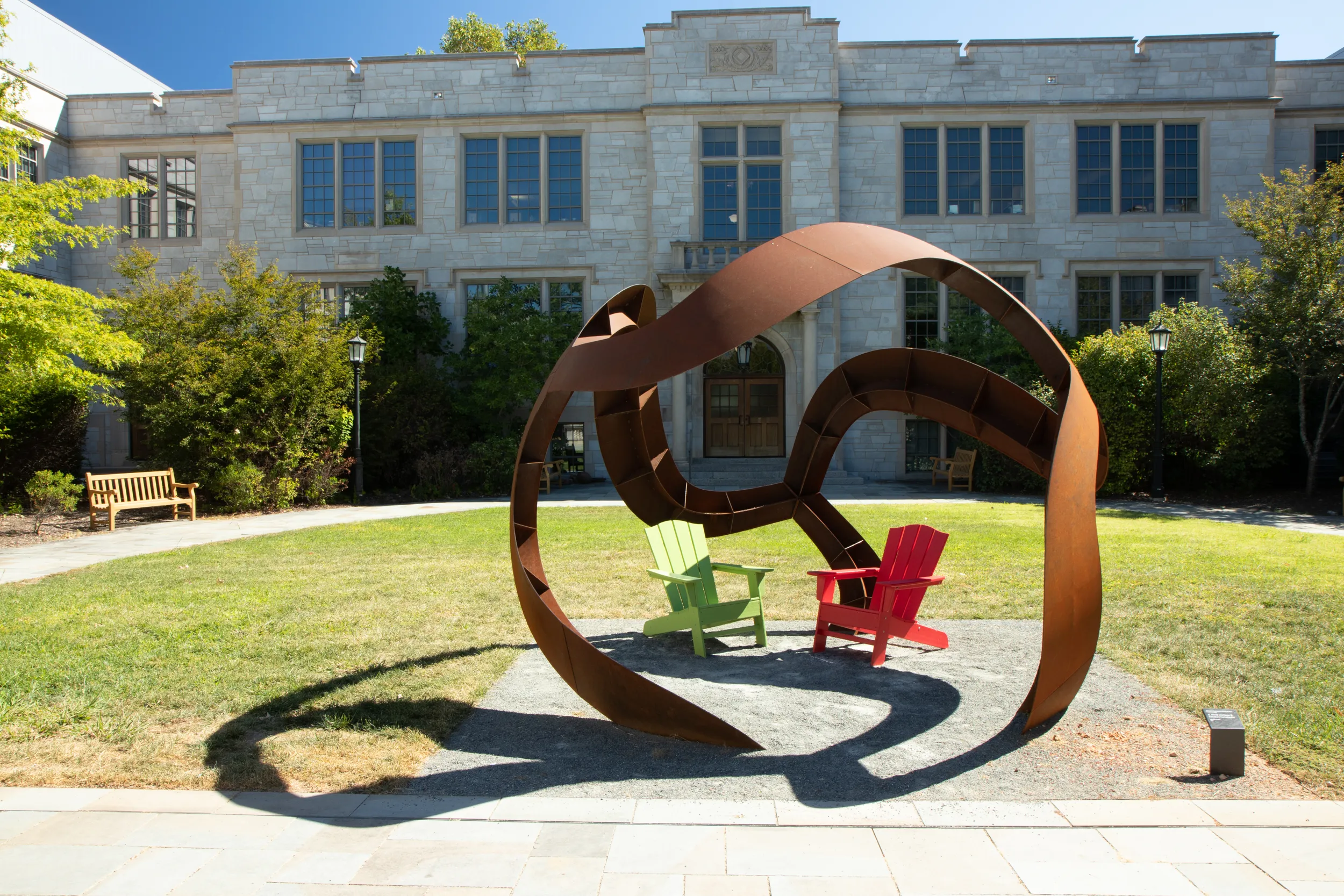 A metal Curvahedra surface made from welded and bolted curved steel pieces.