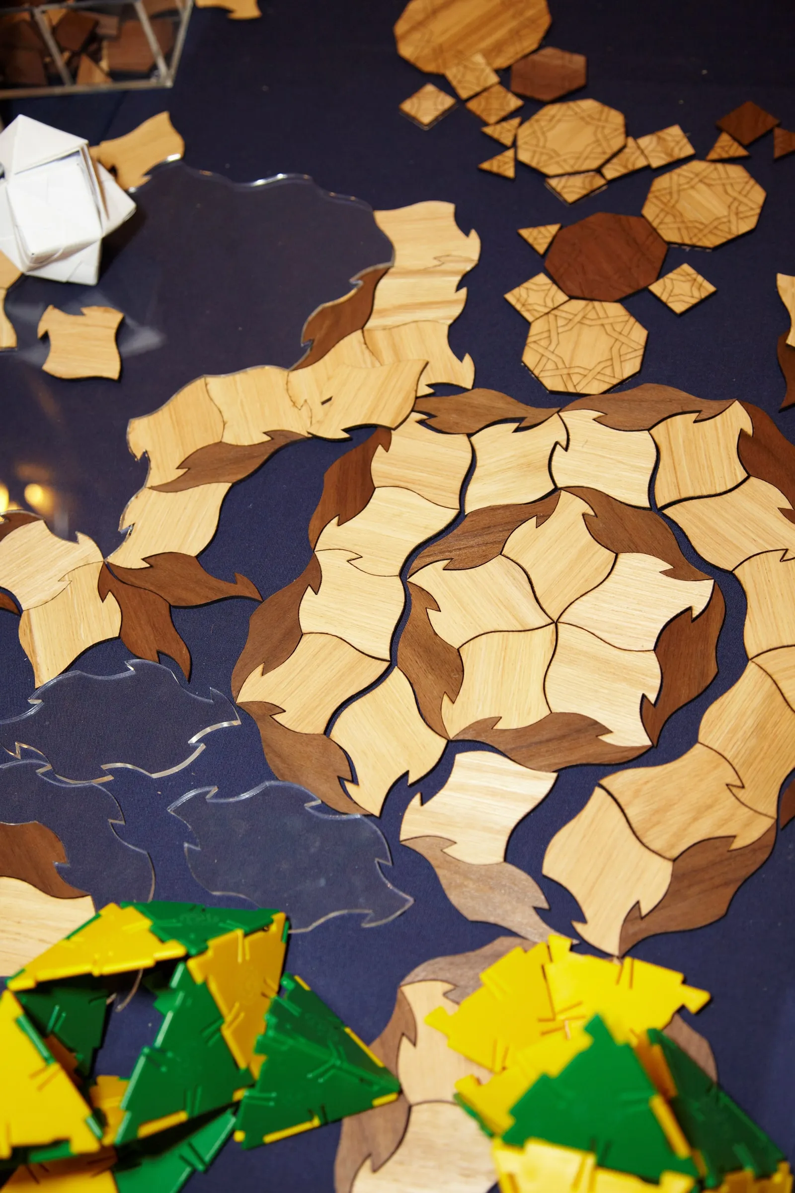 Penrose tile set laid out on a surface