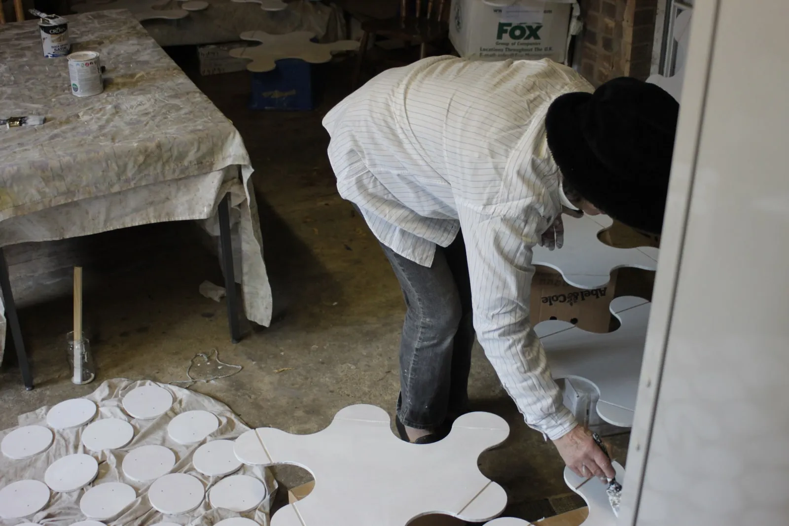 Painting the pieces in the garage before transport to Newcastle